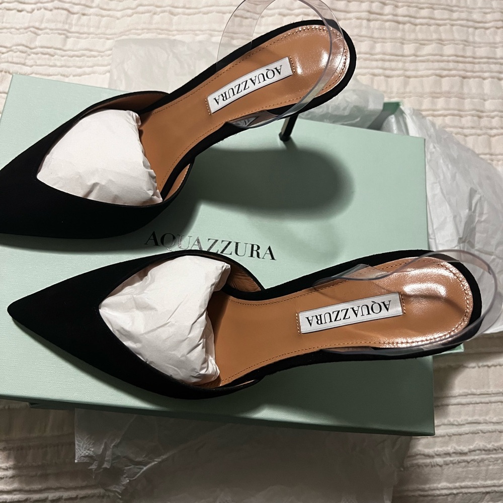 Aquazzura's V Plexi pumps flaunt a suede and a translucent PVC slingback.